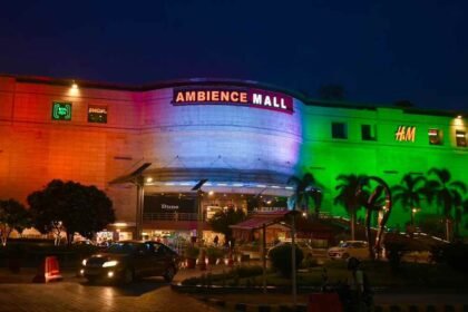 Ambience Mall decorated in Indian tricolour for 80th Independence Day celebrations, featuring the Eternal Flame of Valour installation.