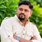 Abhishek Kumar Tripathi founder of MG Construction standing on a residential development site