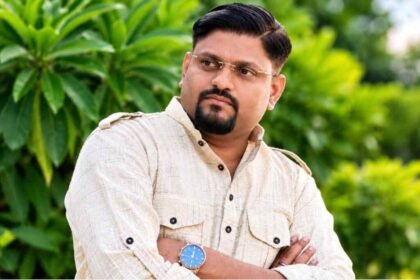 Abhishek Kumar Tripathi founder of MG Construction standing on a residential development site
